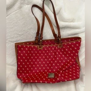 Large red shoulder bag. Dooney and Bourke.